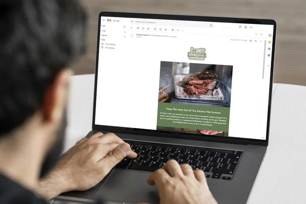 digital marketing channels, man at computer looking at branded messaging