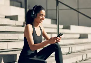 girl looking at digital ads on phone
