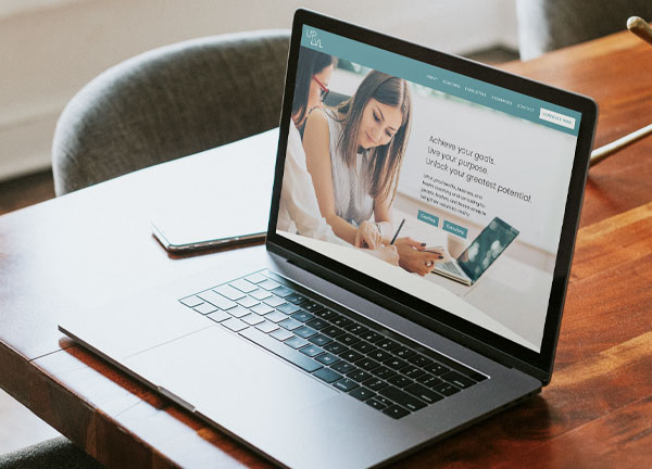 uplvl-laptop-with-homepage-1x