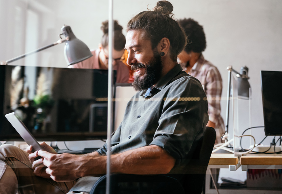man working on laptop for a blog about branding and website design packages